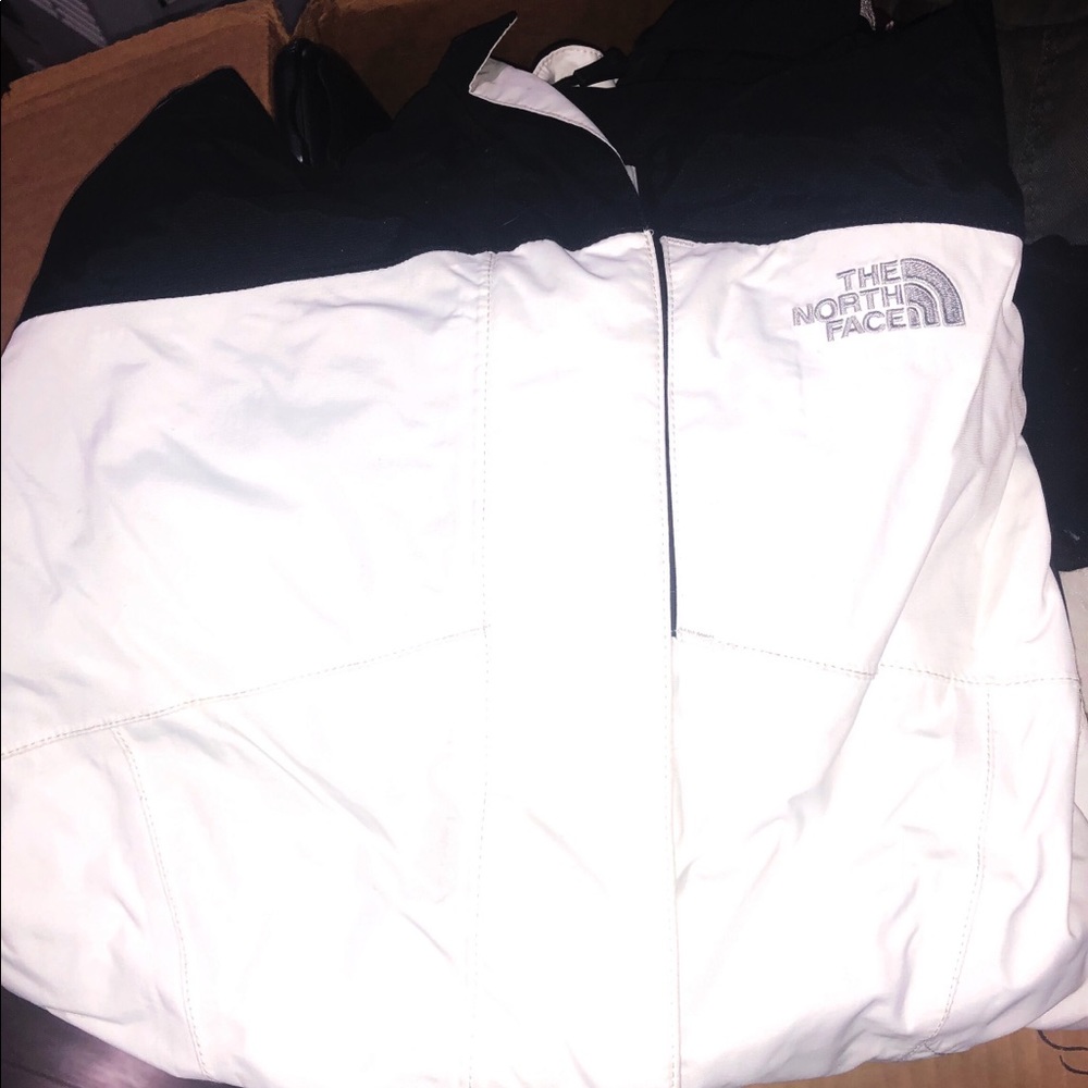 Hard shell North Face snow jacket.